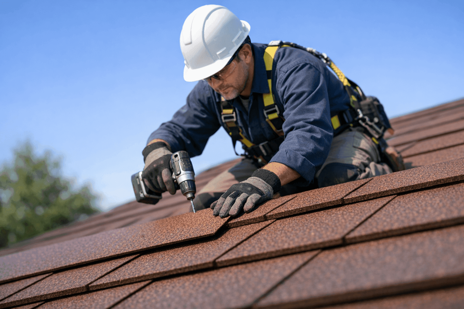 Technician installing fire-resistant roofing panels